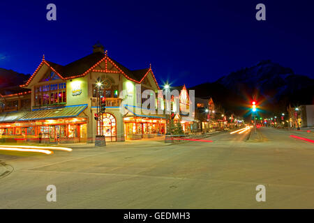geography / travel, Canada, Alberta, Banff National Park, Looking north from the corner of Banff Avenue and Caribou Street towards Cascade Mountain (2998 metres/9836 feet) at night, Town Stock Photo