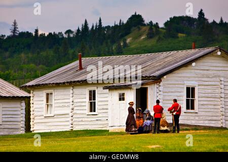 geography / travel, Canada, Saskatchewan, Costumed interpreters gathered outside a building at Fort Walsh National Historic Site, Cypress Hills Interprovincial Park, Sask Stock Photo