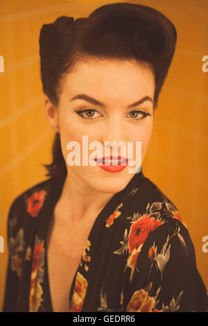 Head and Shoulders Portrait of Young Adult Woman with Vintage Hairstyle Stock Photo
