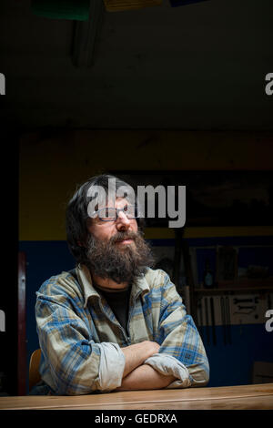 Portrait of Bearded Man in Plaid Shirt Stock Photo