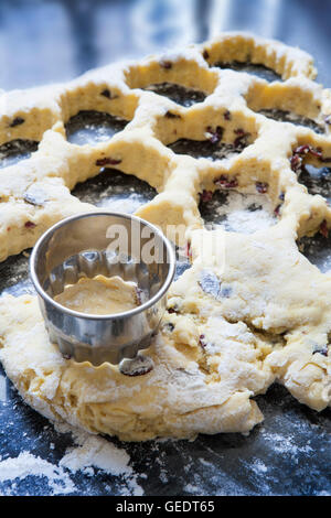 Cutting Dough to Make Cranberry Orange Scones Stock Photo