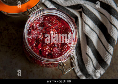 Fig Jam in Glass Jar, High Angle View Stock Photo