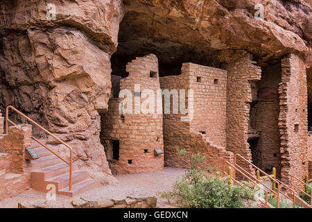 Manitou Cliff Dwellings of the Anasazi, native American Indian tribe. These dwellings were carved out of the soft red sandstone Stock Photo