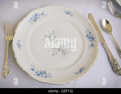 Table setting with fine china and silverware Stock Photo