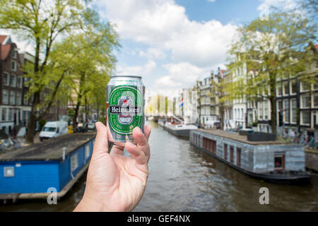 Heineken beer can place on along canal in Amsterdam, Netherlands. Stock Photo