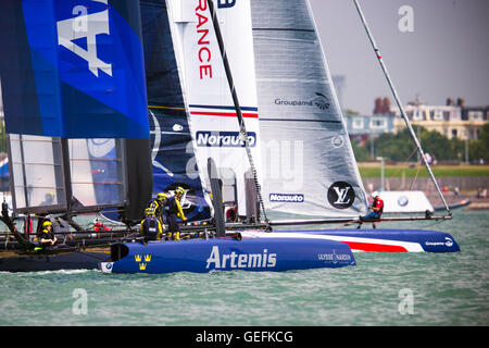 PORTSMOUTH, UK: July, 22, 2016 Team Groupama racing against the Artemis Team on Day 1 in Portsmouth. Stock Photo