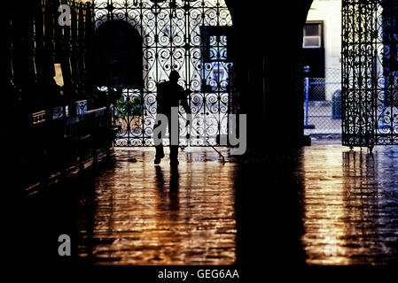 Cleaner in the cloth Hall. Main Market Square. Krakow. Poland. Stock Photo