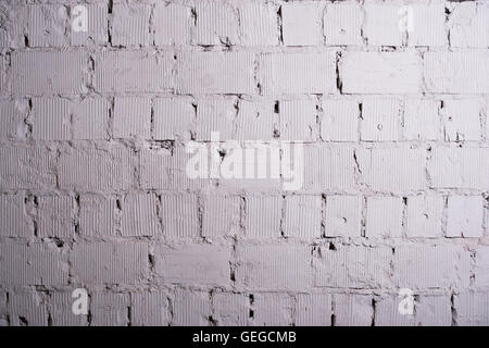 Abstract weathered texture stained old stucco light gray and aged paint white brick wall background in rural room, grungy rusty blocks of stonework technology color horizontal architecture wallpaper Stock Photo