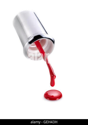 Nail polish brush dripping red color enamel on white background Stock Photo