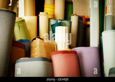 Rolls of materials, fabric and leather used in book binding. Stock Photo