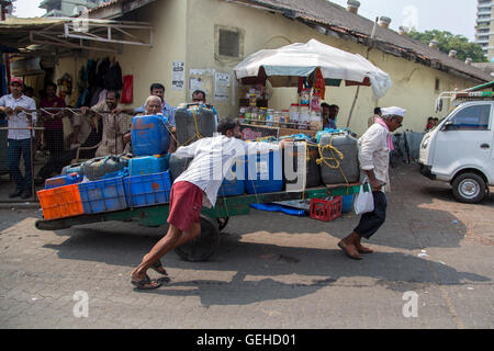 MUMBAI, INDIA - OCTOBER 10, 2015: Unidentified people at Sassoon docks in Mumbai, India. Sassoon Docks is one of the oldest dock Stock Photo