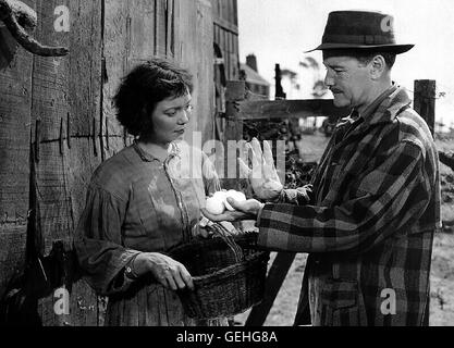 Jane Wyman, Lew Ayres Geduldig bringt Dr. Richardson (Lew Ayres) Belinda (Jane Wyman), die im Dorf verspottet wird, die Zeichensprache bei. *** Local Caption *** 1948, Johnny Belinda, Schweigende Lippen Stock Photo