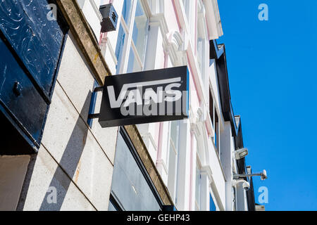 TRURO, CORNWALL, UK - JULY 17, 2016: Vans Shop Sign Logo. Architectural detail of local branch of Vans showing branding on store