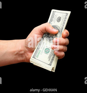 pack of dollars in a fist Stock Photo