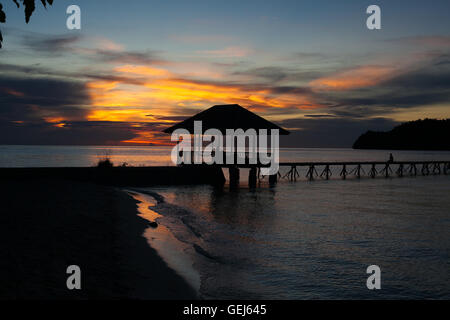 Panoramic View Bungalow in Indonesia Village Tropical Beach in Bali Island Sunset.Romantic Viewpoint.Summer Season Caribbean ocean. Horizontal Picture. Stock Photo