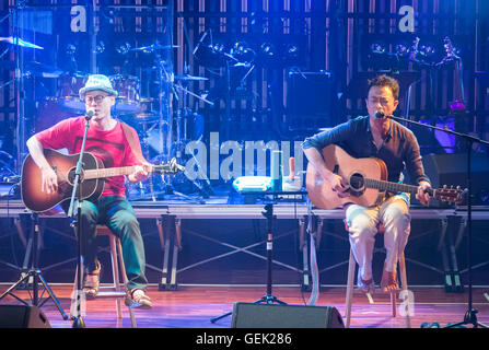 Son Byeong-Hwi and Lee Jung-Yul, Jul 23, 2016 : South Korean singer-songwriter Son Byeong-Hwi (L) and a singer and musical actor Lee Jung-Yul perform as guest singers during a concert of South Korean music group,'Woorinara' at the West Bridge Live Hall in central Seoul, South Korea. The group Woorinara was founded in 1999 and released 5 full-length albums and about 10 project albums. © Lee Jae-Won/AFLO/Alamy Live News Stock Photo