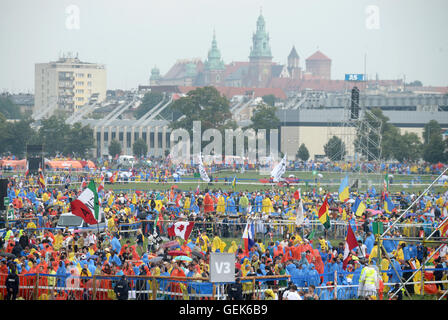 Participate In The Event. 26th July, 2016. People participate in the opening mass of the World Youth Day 2016 in Krakow, Poland, July 26, 2016. More than half a million pilgrims from 187 different countries registered to participate in the event. Photo: Armin Weigel/dpa/Alamy Live News Stock Photo