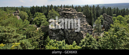 Ehrenfriedersdorf, Germany. 25th July, 2016. View of the Greifensteine rock formation in Ehrenfriedersdorf, Germany, 25 July 2016. Seven bizarre granite rocks reach up to 30 meters over the forest. The view from the rocks over the Erzgebirge region attracts many tourists. PHOTO: JAN WOITAS/dpa/Alamy Live News Stock Photo