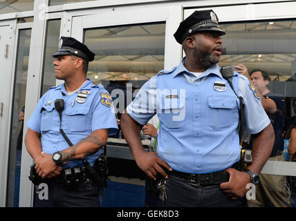 Philadelphia, USA. 26th July, 2016. Police officers stand on guard at the Media Pavilion of Wells Fargo Center, in Philadelphia, Pennsylvania, the United States, July 26, 2016. Credit:  Bao Dandan/Xinhua/Alamy Live News Stock Photo