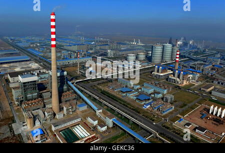 (160727) -- TANGSHAN, July 27, 2016 (Xinhua) -- Photo taken on Oct. 23, 2012 shows an aerial view of Shougang Jingtang United Iron & Steel Co., Ltd. in Tangshan, north China's Hebei Province. In the early hours of July 28, 1976, one of the deadliest earthquakes of the 20th century toppled Tangshan, killing more than 240,000 people and injuring another 160,000. The deadly earthquake leveled Tangshan in just 23 seconds, with 96 percent of the city's architecture generally destroyed. Yet Tangshan has been building a miracle on its debris ever since. By the year 2015, the per capita gross national Stock Photo