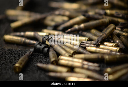 Fired blank 7.62 ammunition fired from a GPMG, (General Purpose Machine Gun) Stock Photo