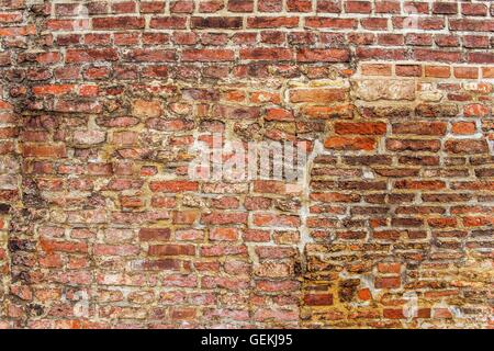 Medieval Brick Wall Background. Red Brick Pattern Backdrop. Stock Photo
