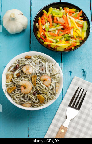 Surimi elvers with prawns, garlic and pepper Stock Photo