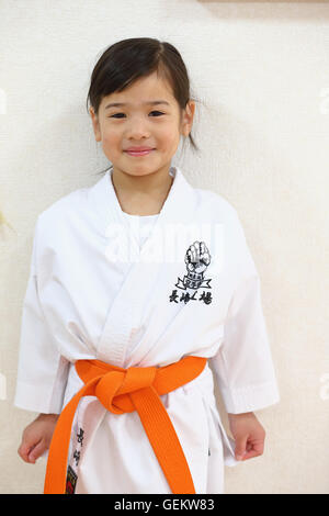 Japanese kid in karate uniform training Stock Photo