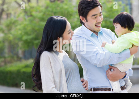 Happy young Chinese family Stock Photo