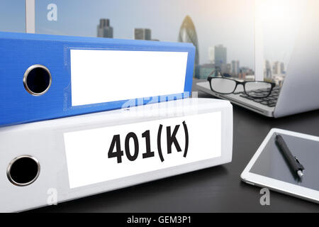 401(K) Office folder on Desktop on table with Office Supplies. Stock Photo