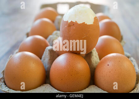 hardboiled egg partly shelled Stock Photo