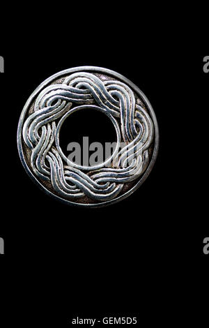 Close up of a silver celtic type symbol Stock Photo