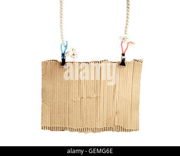 old piece of cardboard on rope Stock Photo