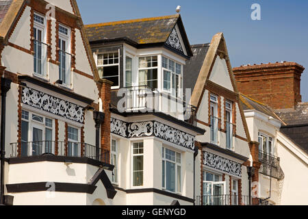 UK, England, Devon, Sidmouth, The Esplanade, decorated upper floors and gables of late victorian seafront building Stock Photo
