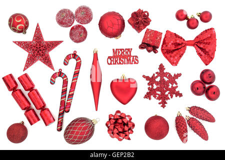 Red christmas tree bauble decorations over white background. Stock Photo