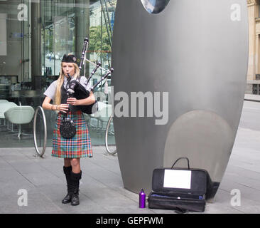 bagpipe player with flames