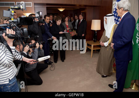 Secretary Kerry Listens as Saudi Foreign Minister al-Jubeir Addresses Reporters Before Their Meeting Focused on Syria in Geneva Stock Photo