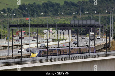 A Hitachi Javelin train passes over the Medway railway bridge near Rochester in Kent. Stock Photo