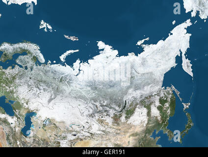 Satellite view of Russia and Central Asia in winter, with partial snow cover (with country boundaries). This image was compiled from data acquired by Landsat 7 & 8 satellites. Stock Photo