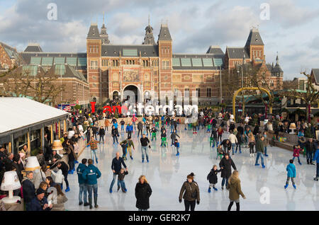 AMSTERDAM, NETHERLANDS - DECEMBER 26, 2015: People skating in front of the Amsterdam Rijksmuseum, the largest and most inportant Stock Photo
