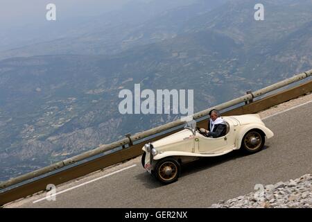 Pre-war Fiat descending the Luberon on a classic car rally in Provence Stock Photo