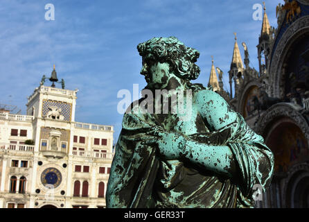 Bronze sculpture from St Mark campanile gate between Basilica and Clocktower in Venice, made by artist Antonio Gai in 1737 Stock Photo