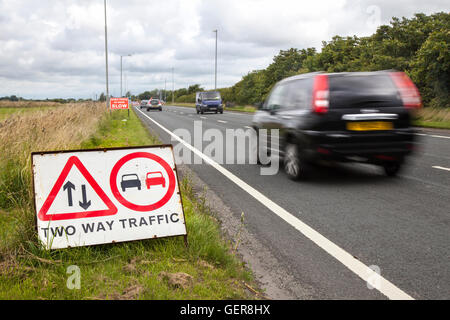Chapter 8 Traffic Management systems in place on major long-term road works and temporary traffic lights on Preston arterial road, B5253 Flensburg Way in Farington Moss, Lancashire, UK. Stock Photo