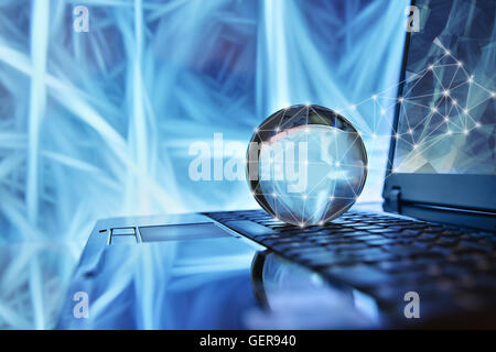Notebook with Globe network concept Stock Photo