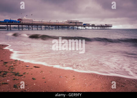 Pier on Paignton beach near Torquay in Devon on a stormy day Stock Photo
