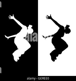 silhouette of a woman who does parkour in city Stock Photo