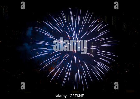 Single Firework Blue single pink blue fireworks burst Stock Photo - Alamy
