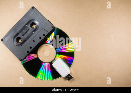 Concept of music evolution. Musicassette, cd and usb support. Vintage and modern. Supports for music Stock Photo