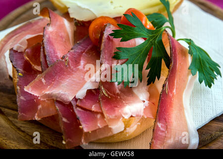 Typical South Tyrolean speck ham, San Candido - Innichen, South Tyrol, Italy Stock Photo