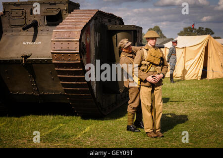 Posing in front of a N17 Niveleur WW1 Mk lV Tank replica at The 6th Annual Combined Ops Show. Stock Photo